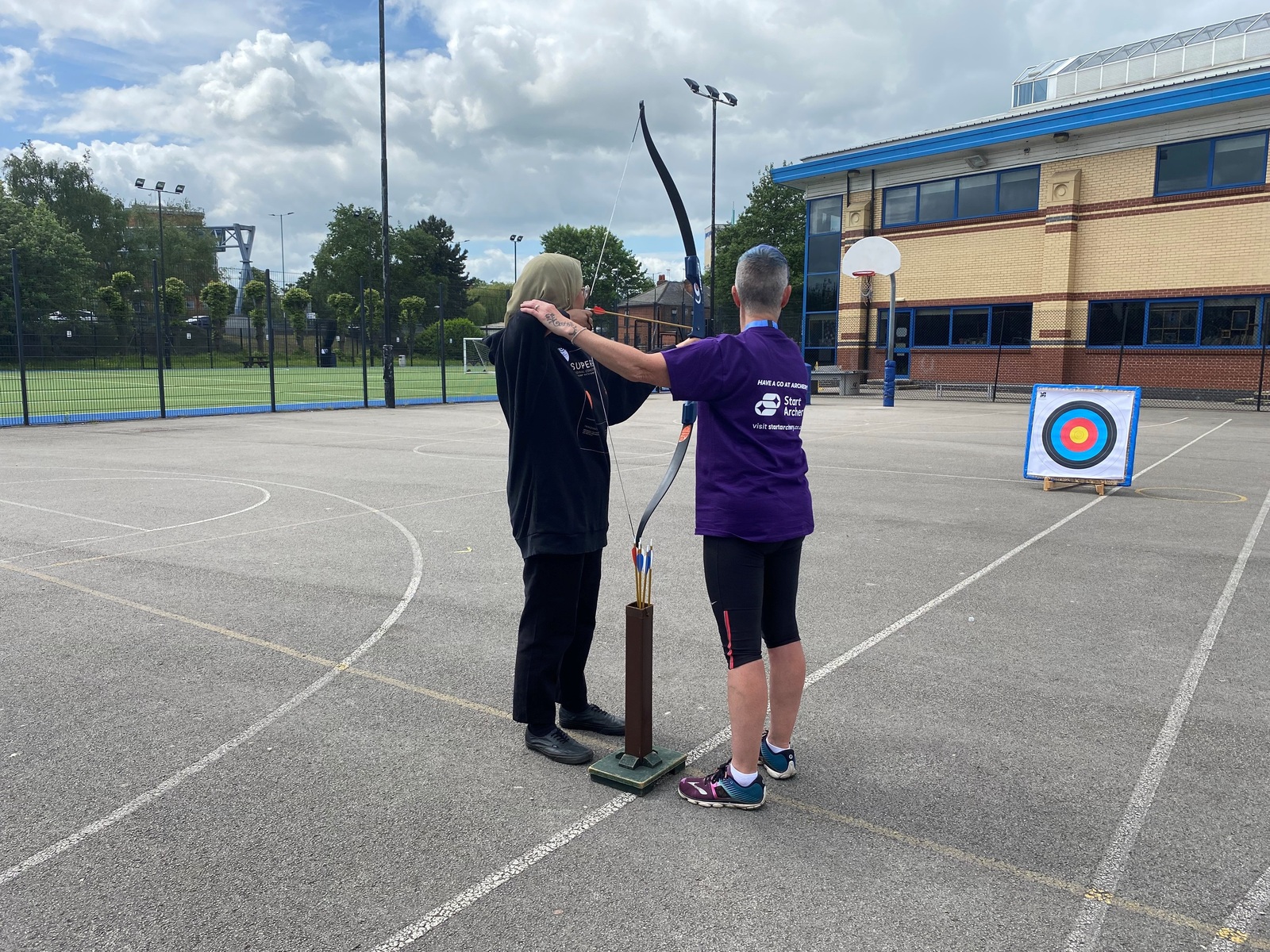 Start Archery Week coach and participant